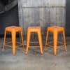 24 Inch Orange Metal Loft Bar Stools